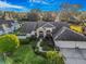 Beautiful home featuring a well-kept lawn, landscaped garden, and a large front entrance with plenty of curb appeal at 2806 Forest Club Dr, Plant City, FL 33566