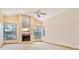 Bright living room with a fireplace and neutral carpet flooring at 2806 Forest Club Dr, Plant City, FL 33566