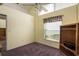 Bright bedroom features a ceiling fan, vaulted ceiling, and natural light at 2991 Covewood Pl, Clearwater, FL 33761