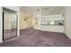 Open living area with chandelier, cabinets, and lots of natural light at 2991 Covewood Pl, Clearwater, FL 33761