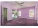 Spacious main bedroom with ensuite bath and access to the lanai at 2991 Covewood Pl, Clearwater, FL 33761