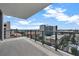 Enjoy city views from this spacious balcony with glass railings and tiled flooring at 301 1St S St # 1206, St Petersburg, FL 33701