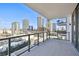 Spacious balcony showcases stunning city views with modern railing and tile flooring at 301 1St S St # 1206, St Petersburg, FL 33701