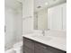 Contemporary bathroom featuring sleek vanity, frameless shower, and neutral color palette at 301 1St S St # 1206, St Petersburg, FL 33701