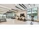 Gym featuring stationary bikes, treadmills, and fitness accessories, along with an expansive mirror to review your posture at 301 1St S St # 1206, St Petersburg, FL 33701