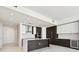 Contemporary kitchen showcasing custom cabinets, stainless steel appliances, and a center island with a quartz countertop at 301 1St S St # 1206, St Petersburg, FL 33701
