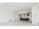Spacious living room featuring tile flooring, modern lighting, and an open kitchen area at 301 1St S St # 1206, St Petersburg, FL 33701