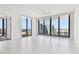Bright, modern living room with floor-to-ceiling windows offering panoramic city views at 301 1St S St # 1206, St Petersburg, FL 33701