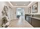Modern lobby featuring sleek wood flooring, unique artwork and a convenient kitchenette area at 301 1St S St # 1206, St Petersburg, FL 33701