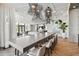 Upscale lounge area features an oversize table and chairs, modern decor and plenty of natural light at 301 1St S St # 1206, St Petersburg, FL 33701