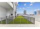Rooftop deck with faux grass and stunning city views, offering a relaxing outdoor space at 301 1St S St # 1206, St Petersburg, FL 33701