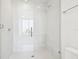 Modern bathroom shower with glass enclosure, tile surround, and sleek fixtures at 301 1St S St # 1206, St Petersburg, FL 33701