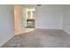 Neutral bedroom with carpeted floors, connecting to a bathroom with a double vanity at 3021 Countryside Blvd # 26A, Clearwater, FL 33761