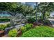 View of the Countryside Country Club community sign and landscaping at 3021 Countryside Blvd # 26A, Clearwater, FL 33761