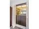 The wet bar offers a sink and cabinet space for entertaining guests at 3021 Countryside Blvd # 26A, Clearwater, FL 33761