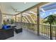 The screened porch is perfect for relaxing and enjoying the beautiful view of the backyard at 3114 Bluff Blvd, Holiday, FL 34691