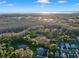 Stunning aerial view highlighting the community's beautiful natural surroundings and desirable location at 3198 Thatcher Ln, Tarpon Springs, FL 34688