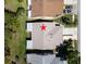 Aerial view of the home showcasing the roof and surrounding landscape at 3212 Mcmath Dr, Palm Harbor, FL 34684