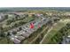 Overhead view of a residential area adjacent to the lush green golf course at 3215 Banyan Hill Ln, Land O Lakes, FL 34639