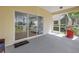 The screened patio offers seamless indoor/outdoor living, perfect for entertaining and relaxing at 3215 Banyan Hill Ln, Land O Lakes, FL 34639