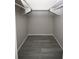 Spacious walk in closet features new floors and plenty of hanging storage at 3603 Darlington Rd, Holiday, FL 34691