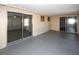 Large lanai with sliding glass doors, offering access to both indoor and outdoor spaces at 3603 Darlington Rd, Holiday, FL 34691
