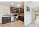 Well-lit kitchen features stainless steel appliances, wood cabinets, and stylish backsplash at 4030 Marlin Se Dr, St Petersburg, FL 33705