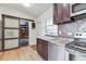 Pantry has a custom wood barn door, great for storing lots of food items at 4030 Marlin Se Dr, St Petersburg, FL 33705
