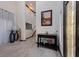 Bright foyer features a grand staircase, elegant decor, and tile flooring at 487 Pinellas Bayway S # 6, Tierra Verde, FL 33715