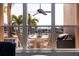 Lanai with comfortable seating and views of the water and surrounding neighborhood at 487 Pinellas Bayway S # 6, Tierra Verde, FL 33715
