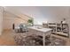 Cozy loft featuring a comfortable seating area, stylish desk, and ample natural light for a relaxing workspace at 487 Pinellas Bayway S # 6, Tierra Verde, FL 33715
