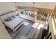 Inviting main bedroom with wood floors, a vaulted ceiling, and beautiful natural light with balcony access at 487 Pinellas Bayway S # 6, Tierra Verde, FL 33715