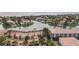 Aerial view of a waterfront community, showing the houses, docks, and the waterway at 487 Pinellas Bayway S # 6, Tierra Verde, FL 33715