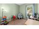 Versatile bedroom with carpet floors, a window view, and ample space for various uses at 5123 Whispering Leaf Trl, Valrico, FL 33596