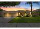 Charming single-story home featuring a well-maintained lawn, mature palms, a two-car garage and inviting curb appeal at 5123 Whispering Leaf Trl, Valrico, FL 33596