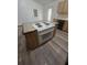 Functional kitchen island with a cooktop providing ample space for food preparation at 5425 Leisure St, Dade City, FL 33523