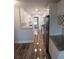 Bright kitchen featuring white cabinets, stainless steel appliances, and granite countertops at 5725 80Th N St # 314, St Petersburg, FL 33709
