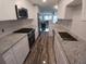 Bright renovated kitchen featuring stainless steel appliances and granite countertops at 5725 80Th N St # 314, St Petersburg, FL 33709