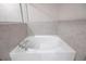 Bathroom featuring a white soaking tub at 607 Royal Empress Dr, Ruskin, FL 33570