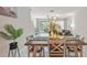 Open-concept dining room with a view of the living area and outdoor scenery at 607 Royal Empress Dr, Ruskin, FL 33570