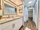 Updated bathroom features granite countertops and updated vanity at 610 S Woodlands Dr, Oldsmar, FL 34677