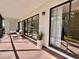 Screened lanai featuring seating and view to the interior at 610 S Woodlands Dr, Oldsmar, FL 34677