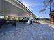 Community pavilion with foosball table, ample seating, and manicured landscaping at 610 S Woodlands Dr, Oldsmar, FL 34677