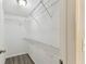 Walk-in closet featuring white wire shelving throughout at 6316 S Richard Ave, Tampa, FL 33616