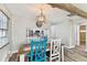 Dining room featuring a modern pendant light fixture and a view of kitchen at 6316 S Richard Ave, Tampa, FL 33616