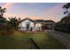Charming single-story home featuring a well-manicured lawn and carport at 6316 S Richard Ave, Tampa, FL 33616