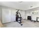 Inside the garage with access doors, plenty of space, and equipment at 6316 S Richard Ave, Tampa, FL 33616