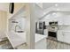 Renovated kitchen featuring stainless steel appliances and a convenient breakfast bar with bar stool seating at 6316 S Richard Ave, Tampa, FL 33616