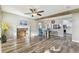 Spacious living room featuring wood-look floors and decorative fireplace at 6316 S Richard Ave, Tampa, FL 33616