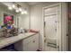 Bathroom showcasing a sink vanity with white cabinets, countertop and a shower-tub combination at 6475 23Rd N St, St Petersburg, FL 33702